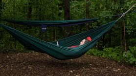 person laying in a hammock