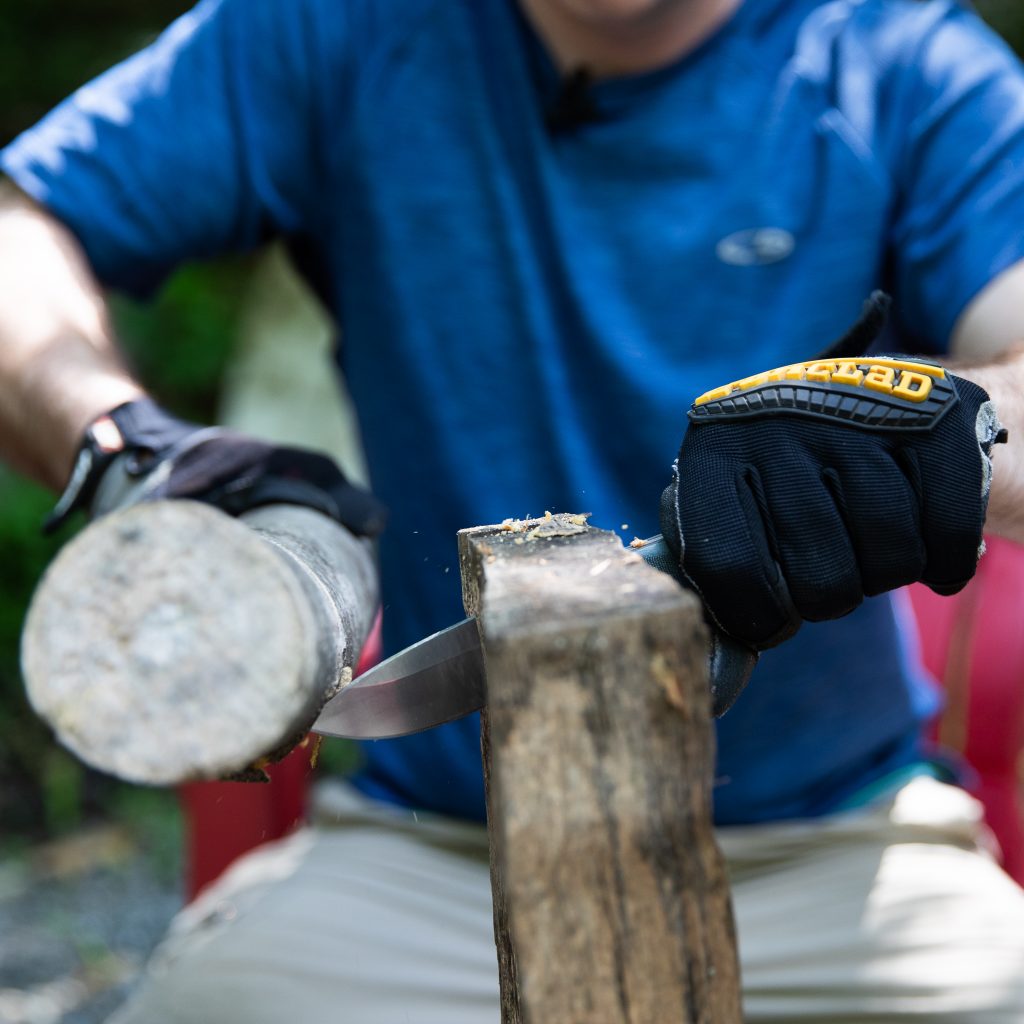 batoning wood with a knife