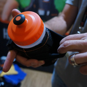 orange mud hand held water bottle