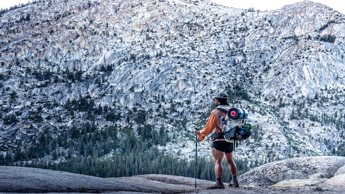 at-thru-hiker-snow-storm-backcountry.